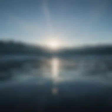 Close-up of a calm water surface reflecting the sky