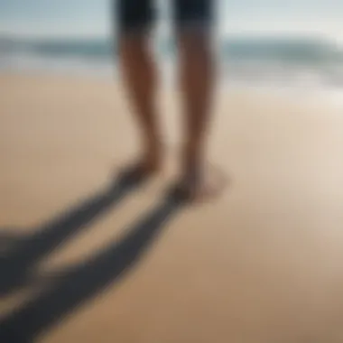 Walking Meditation by the Sea Close-up of feet walking on a sandy beach, symbolizing the connection between movement and meditation
