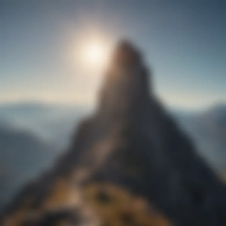 A mountain peak basking in sunlight, illustrating triumph over challenges.