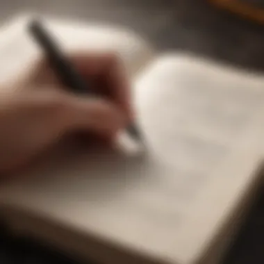 An open book with a pen resting on it