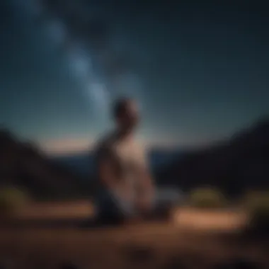 A person meditating under a starry sky