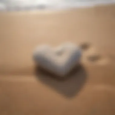 Embracing Self-Love A heart-shaped stone on a sandy beach