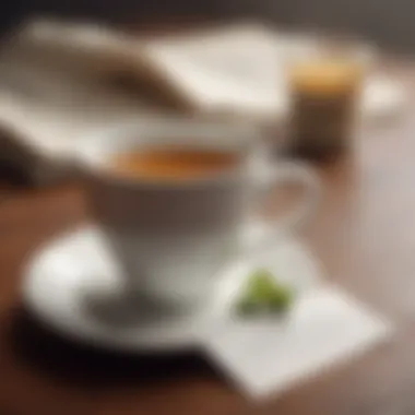 Close-up of a cup of tea with a gratitude quote card beside it, promoting mindfulness